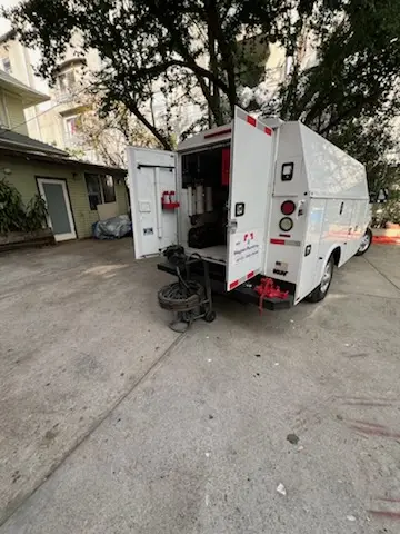 Magnet Plumbing service vehicle on-site for Grease Trap Cleaning in Colonial Beach